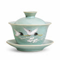 Gaiwan 180 ml diamètre 12 cm en céramique vert céladon décor grues style traditionnel